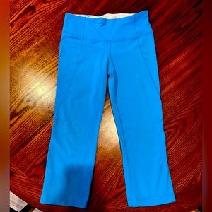 Lululemon athletic capri’s with light flower inside band.